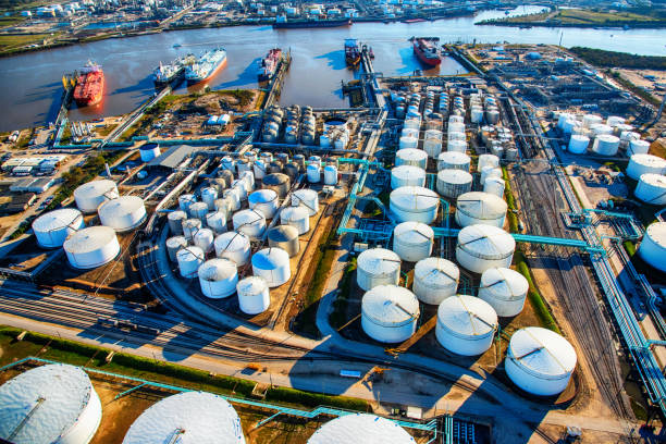 A group of large sea baring oil tankers moored at a Texas oil refinery near Trinity Bay just outside of Houston, Texas, loading oil for export throughout the world.